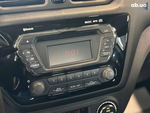 Kia Rio 2012 - фото 29