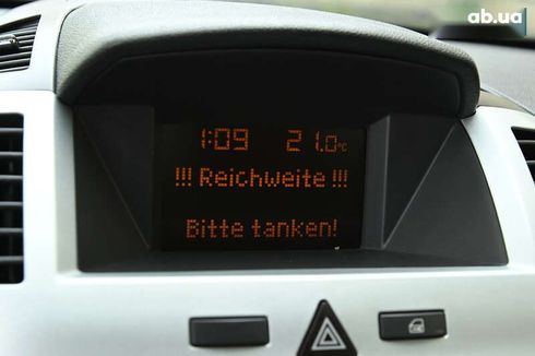 Opel Zafira 2009 - фото 19