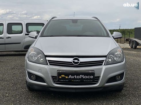 Opel Astra 2010 - фото 23