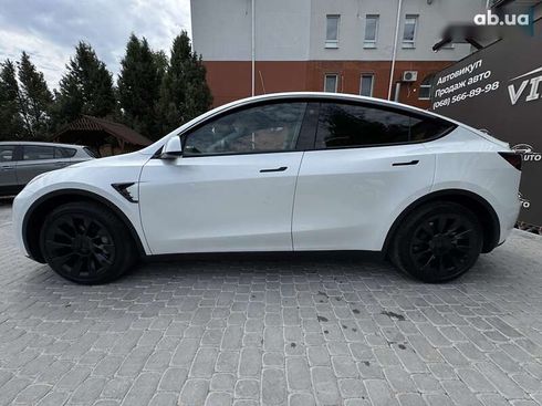 Tesla Model Y 2024 - фото 14
