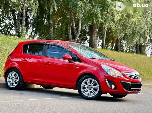 Opel Corsa 2011 - фото 7