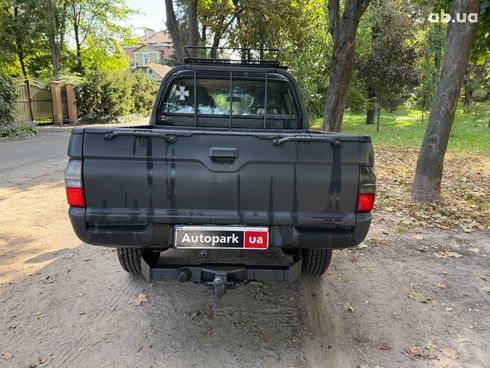 Mitsubishi l 200 2005 серый - фото 7