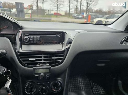 Peugeot 208 2012 - фото 14
