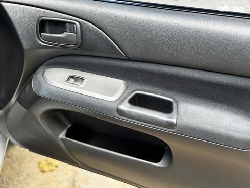 Mitsubishi Lancer 2005 серый - фото 56