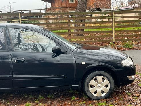 Nissan Almera 2008 черный - фото 45