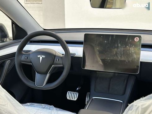 Tesla Model Y 2024 - фото 18