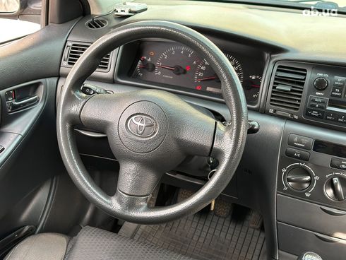 Toyota Corolla 2005 серый - фото 36