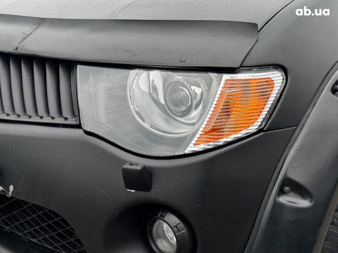 Mitsubishi l 200 2009 черный - фото 9