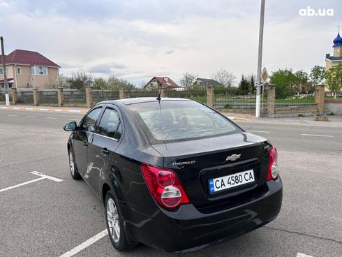 Chevrolet Aveo 2013 черный - фото 3