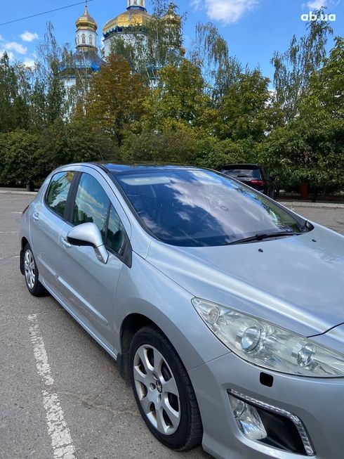 Peugeot 308 2011 серебристый - фото 11