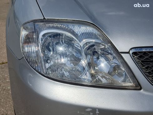 Toyota Corolla 2003 серый - фото 4