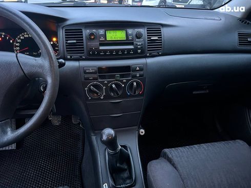 Toyota Corolla 2002 серый - фото 25