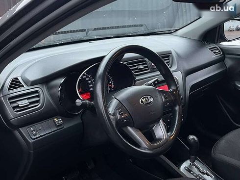 Kia Rio 2013 - фото 13