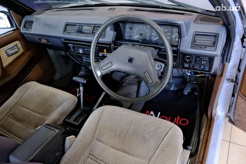 Isuzu Aska 1999 серый - фото 7
