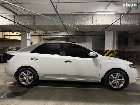 Kia Cerato 2011 - фото 11