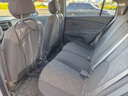 Kia Rio 2008 серебристый - фото 3