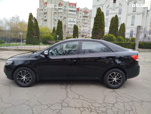 Kia Cerato 2009 черный - фото 8