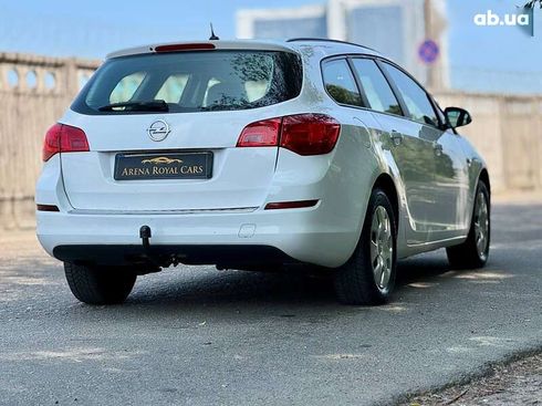 Opel Astra 2011 - фото 11