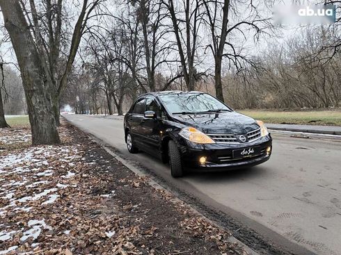 Nissan Tiida 2012 - фото 26