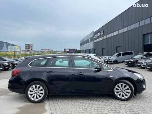 Opel Astra 2011 черный - фото 41