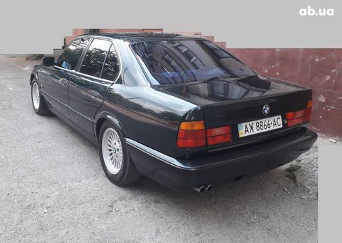 BMW 5 серия 1994 зеленый - фото 4