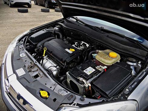 Opel Astra 2009 - фото 16