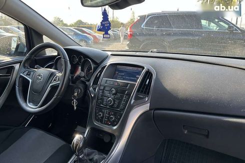 Opel Astra 2011 - фото 25
