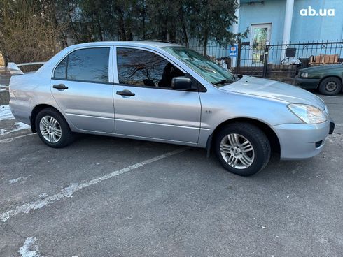 Mitsubishi Lancer 2004 серый - фото 4