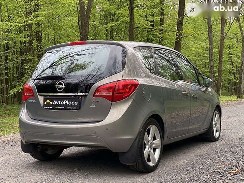 Opel Meriva 2011 - фото 12