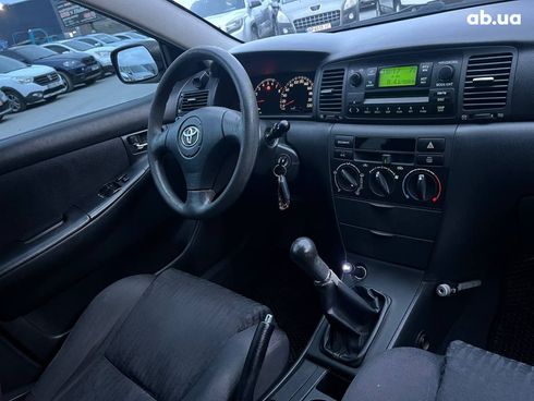 Toyota Corolla 2002 серый - фото 36
