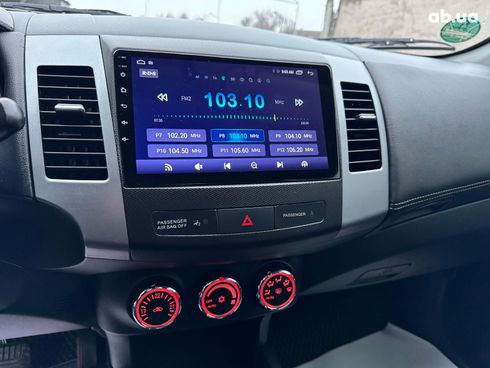 Mitsubishi Outlander XL 2011 черный - фото 21