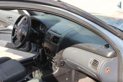 Nissan Almera 2005 - фото 17