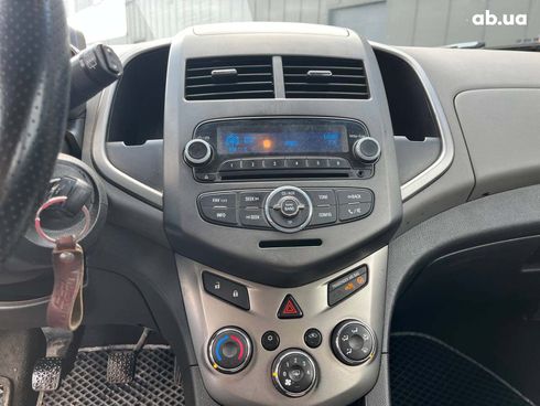 Chevrolet Aveo 2011 черный - фото 13