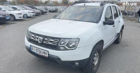 Dacia Duster 2015 белый - фото 5