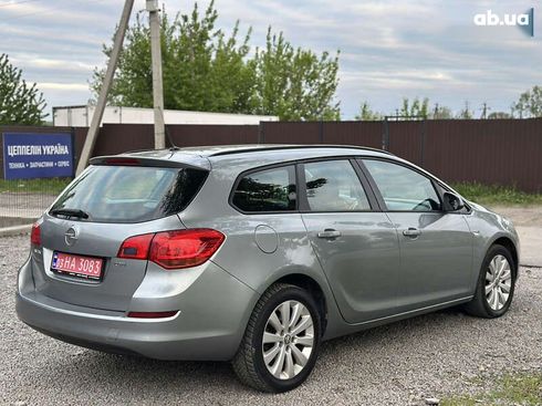 Opel Astra 2010 - фото 23