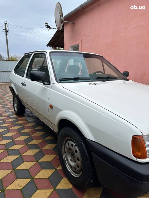 Volkswagen Polo 1994 белый - фото 5