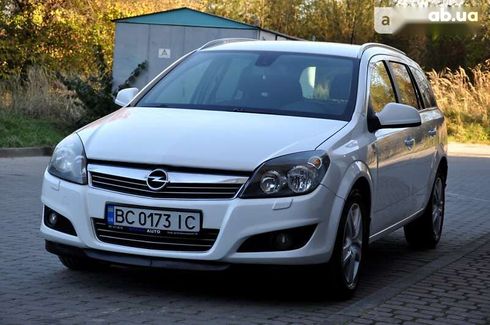 Opel Astra 2010 - фото 14