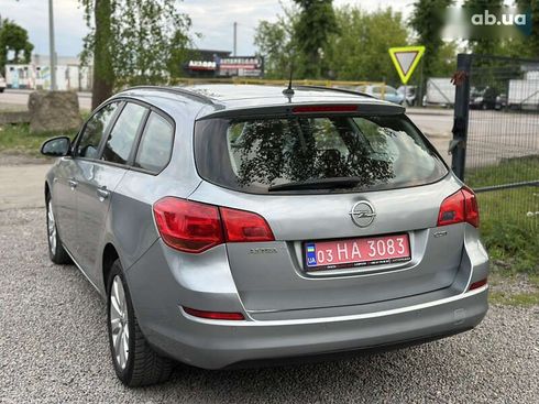 Opel Astra 2010 - фото 14