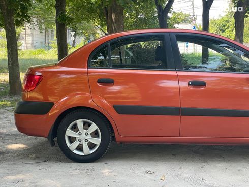Kia Rio 2008 оранжевый - фото 5