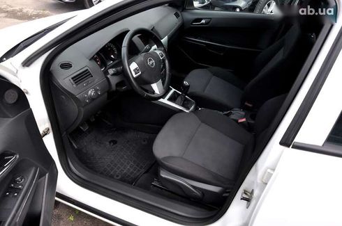 Opel Astra 2013 - фото 16