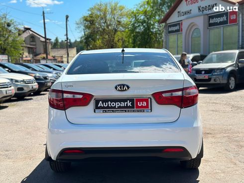 Kia Rio 2013 белый - фото 6