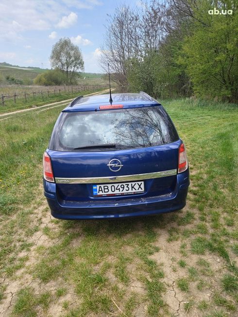 Opel Astra 2006 синий - фото 18