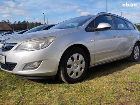 Opel Astra J 2011 серебристый - фото 13