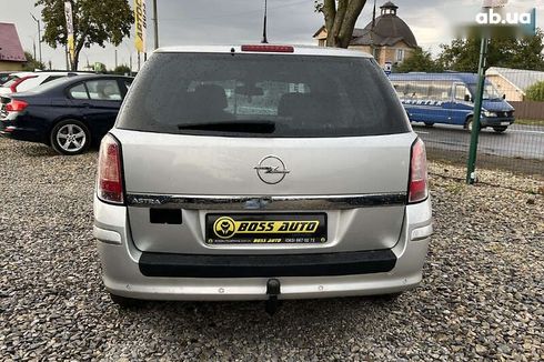 Opel Astra 2010 - фото 5