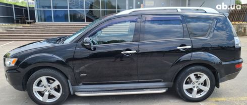 Mitsubishi Outlander XL 2011 черный - фото 18