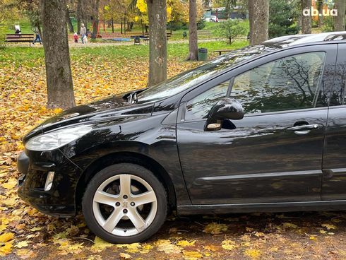Peugeot 308 2011 черный - фото 7