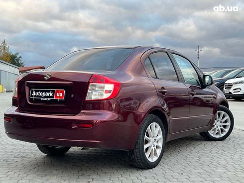 Suzuki SX4 2010 красный - фото 6