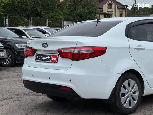 Kia Rio 2013 белый - фото 12