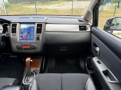 Nissan Tiida 2011 - фото 21