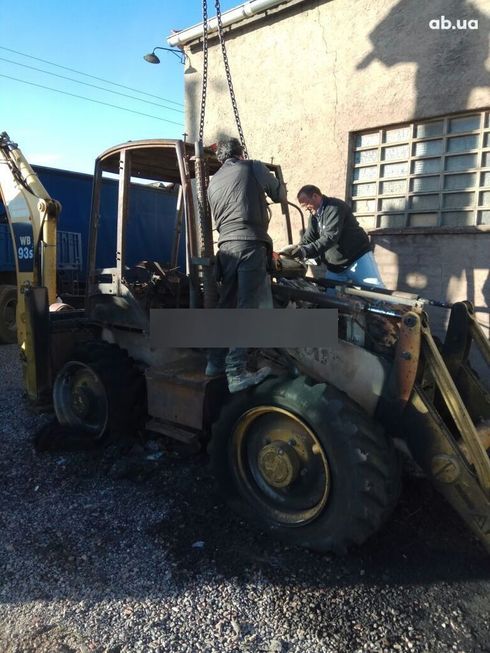 Komatsu WB 2007 - фото 10